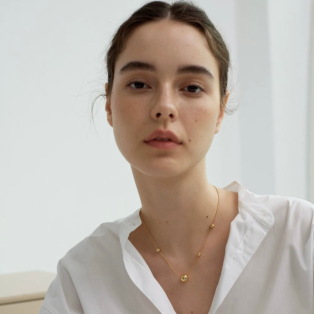 Gold sphere ball necklace
