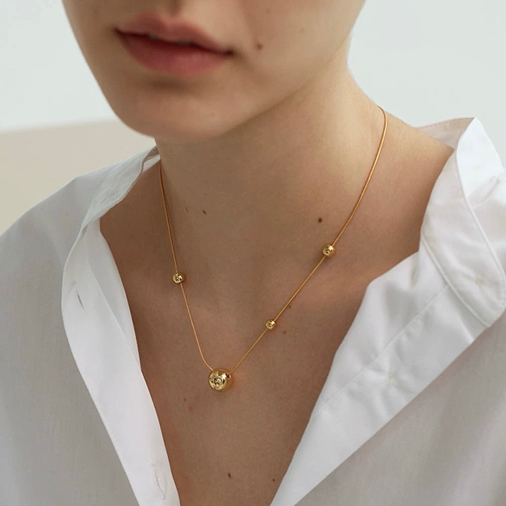 Gold sphere ball necklace